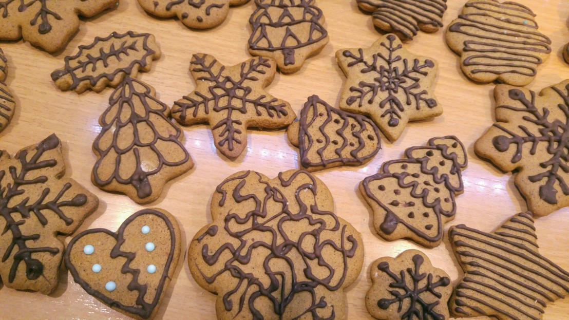 Gingerbread cookies decorated with dark chocolate